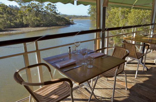 Dining for two on deck overlooking mangrove banked Coffs Creek Things to do in Coffs harbour near Diggers Beach Cottage